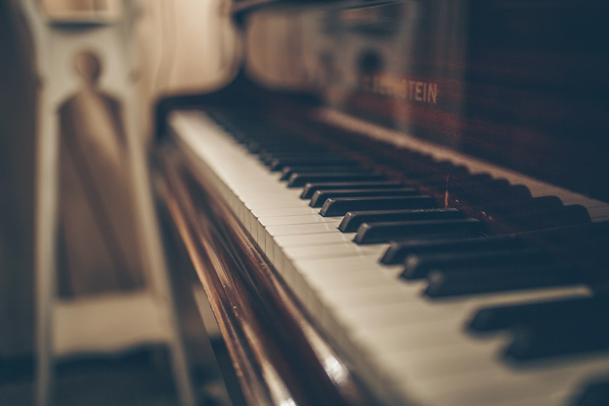 Piano keys in soft, warm light